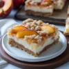 Peach Cobbler Cheesecake Bars